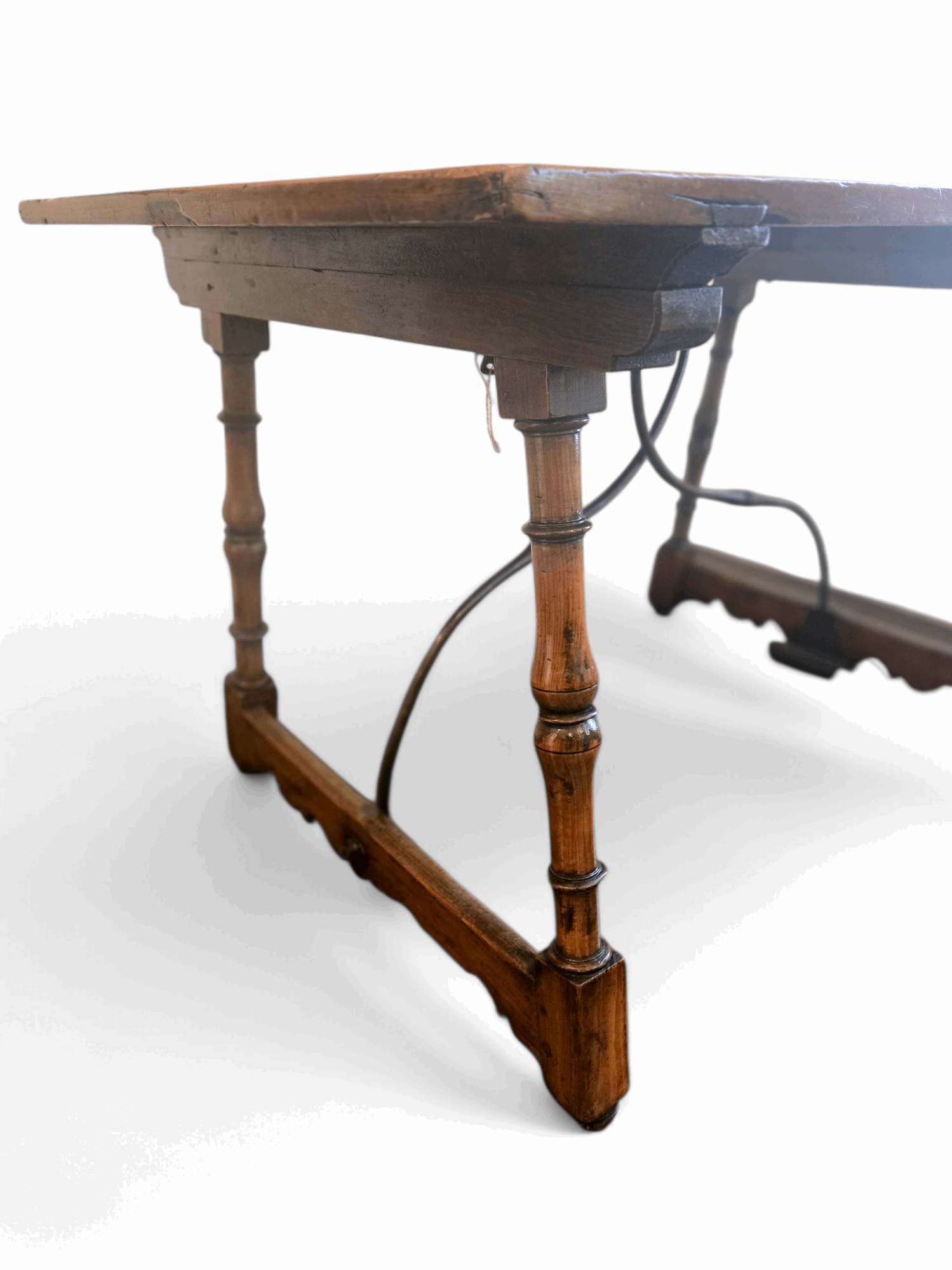 Spanish fruitwood table with iron fiadores