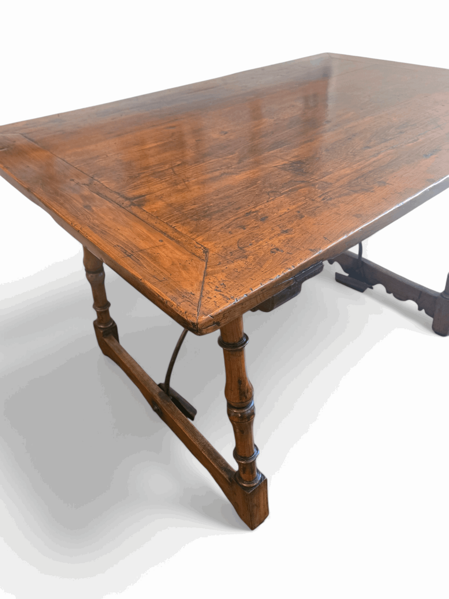 Spanish fruitwood table with iron fiadores