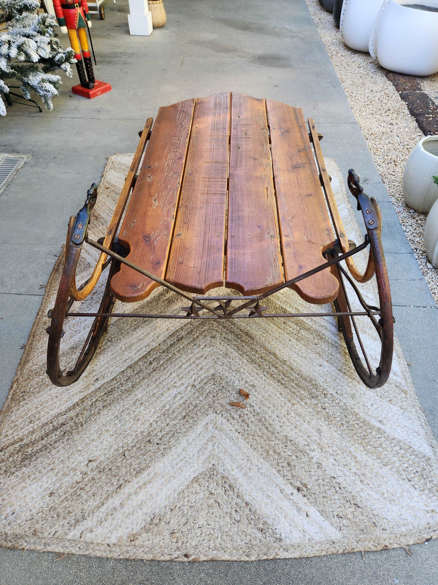 Antique pine sleigh with swan head detail and iron runners