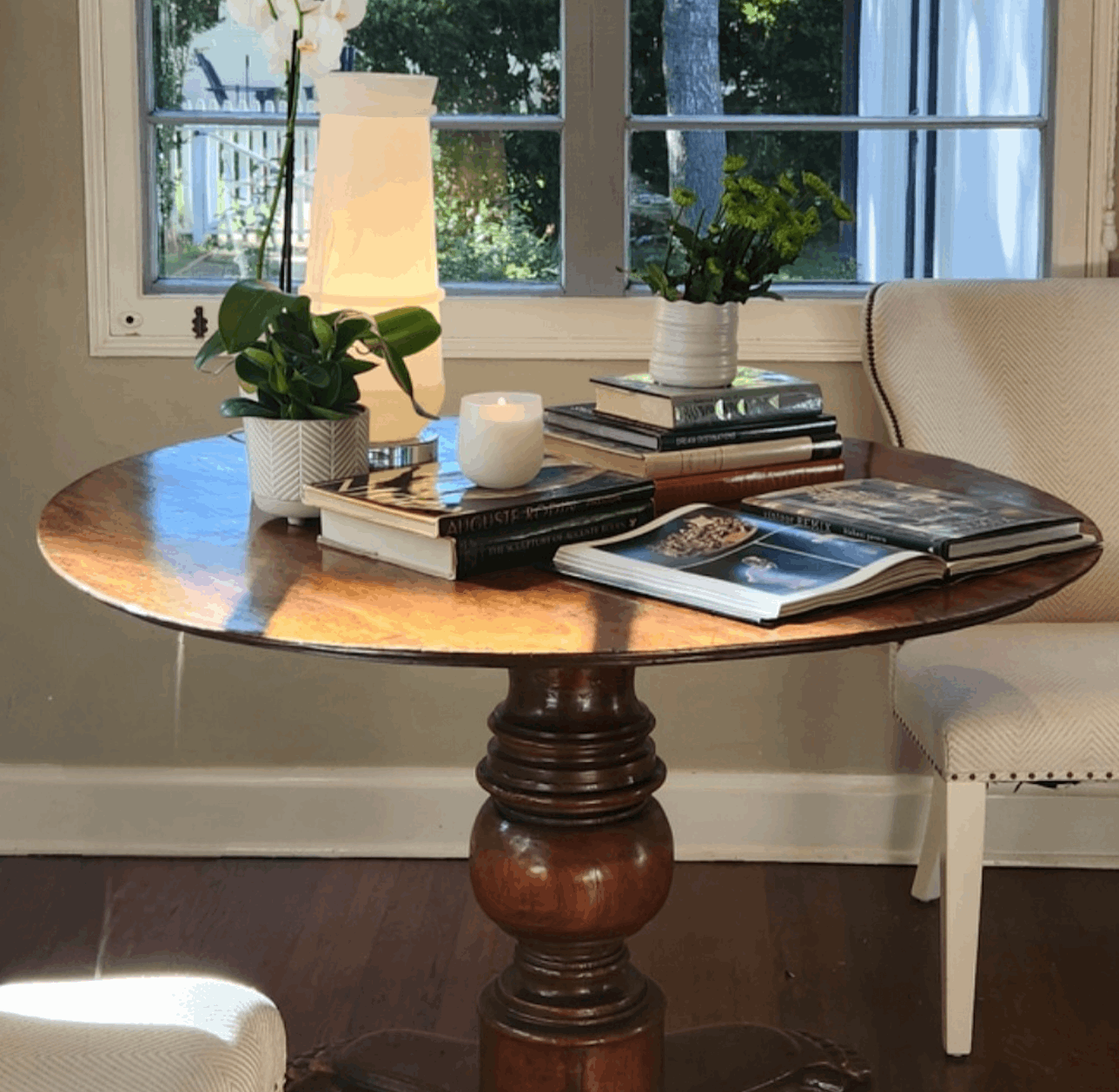 Antique Italian Round Walnut Pedestal Table with carved feet base